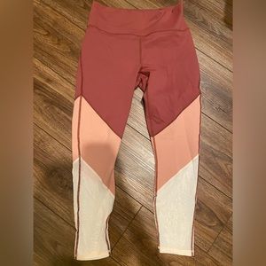 BRAND NEW with tags!Fabletics work out leggings. Mauve, peach, white Size medium